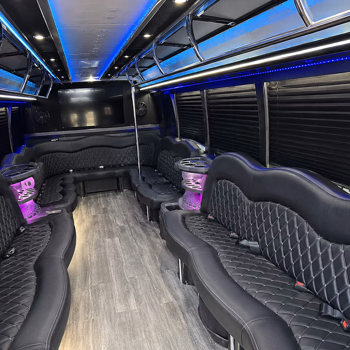 Wedding guests seated inside a party bus serving Davie
